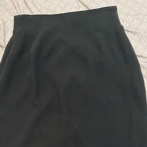 Woman’s black pencil skirt